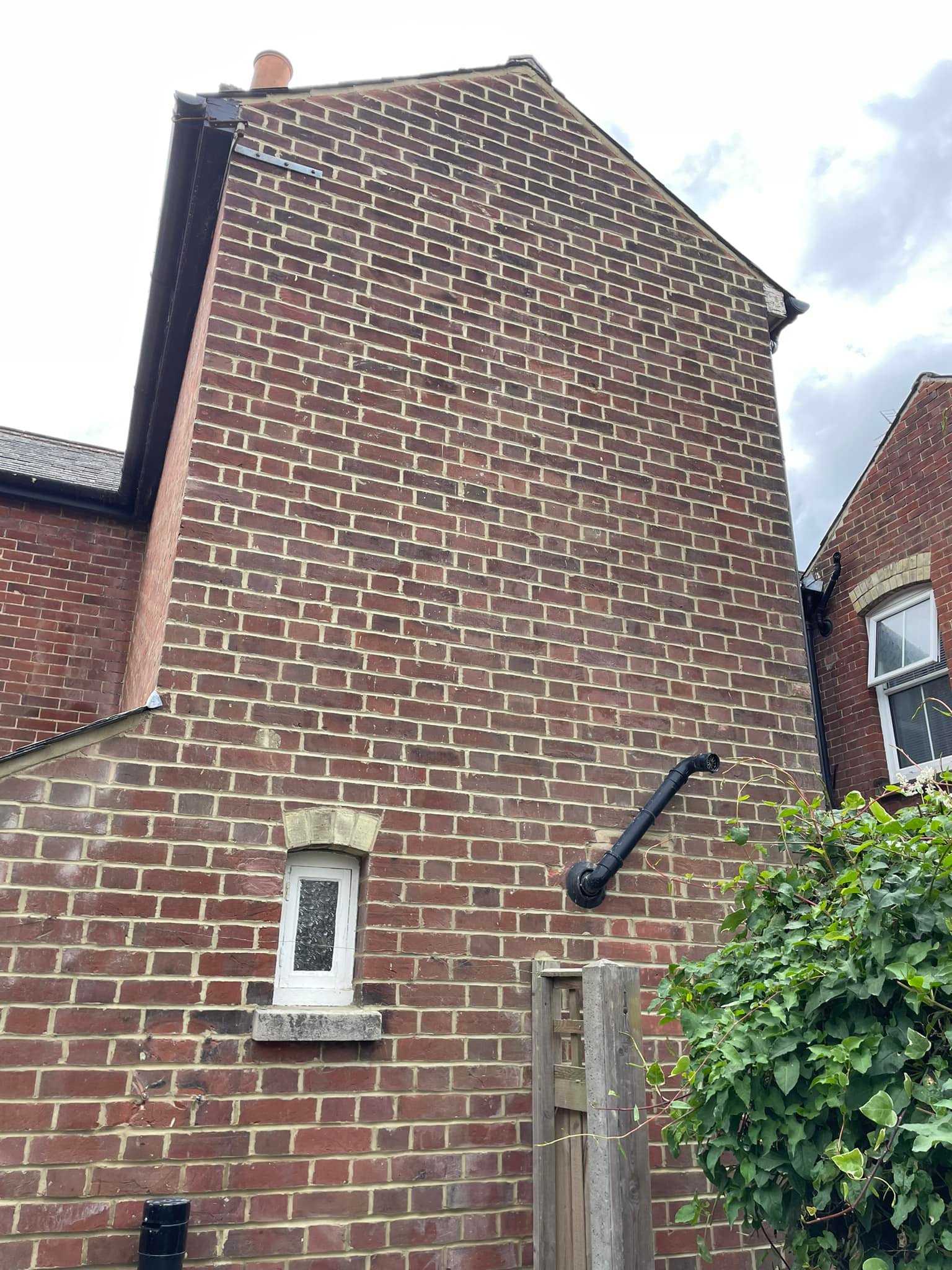 Guttering services and brick repointing carried out at a house in Faversham by CL Baker
