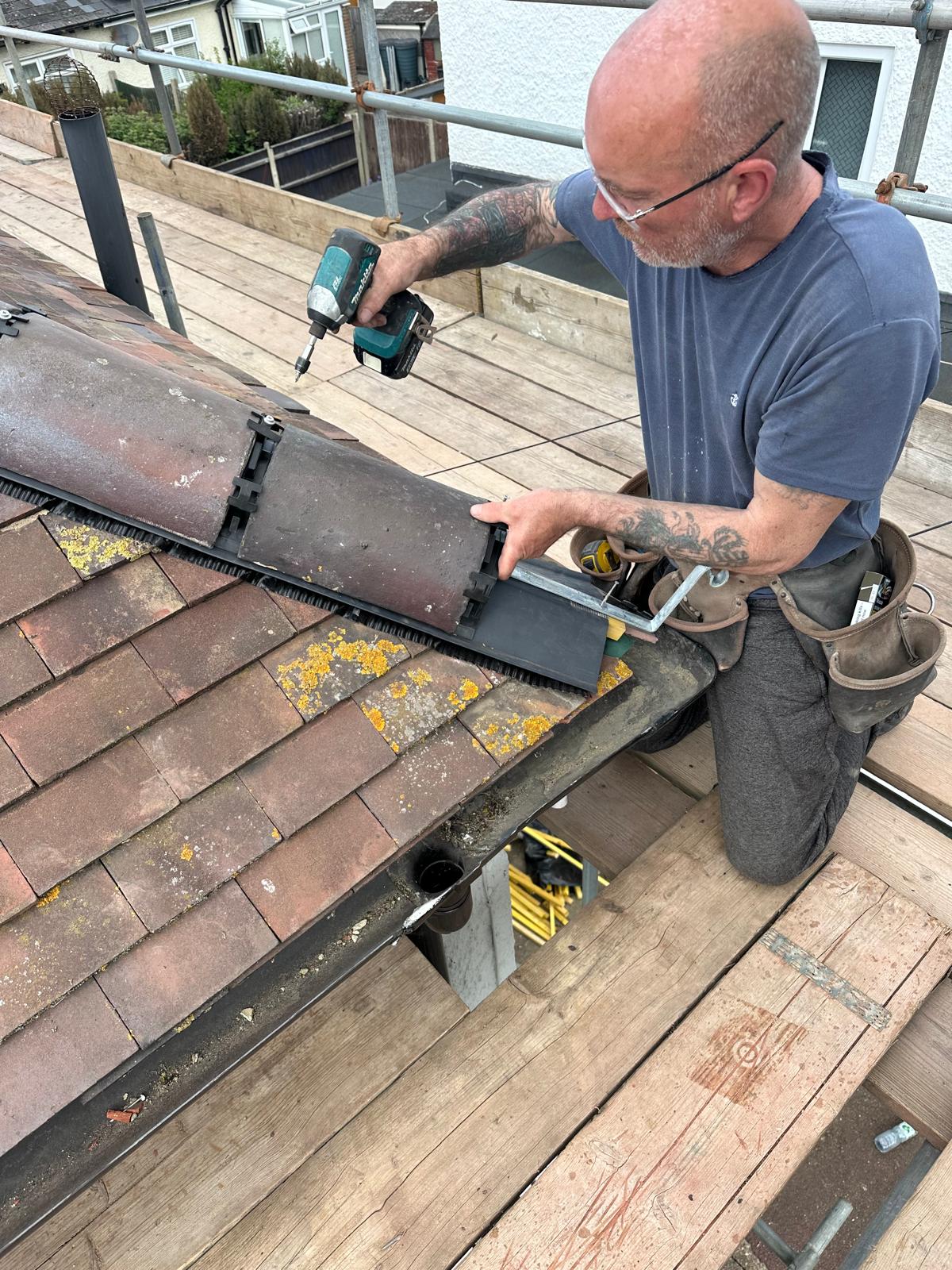 tiled roof repair underway